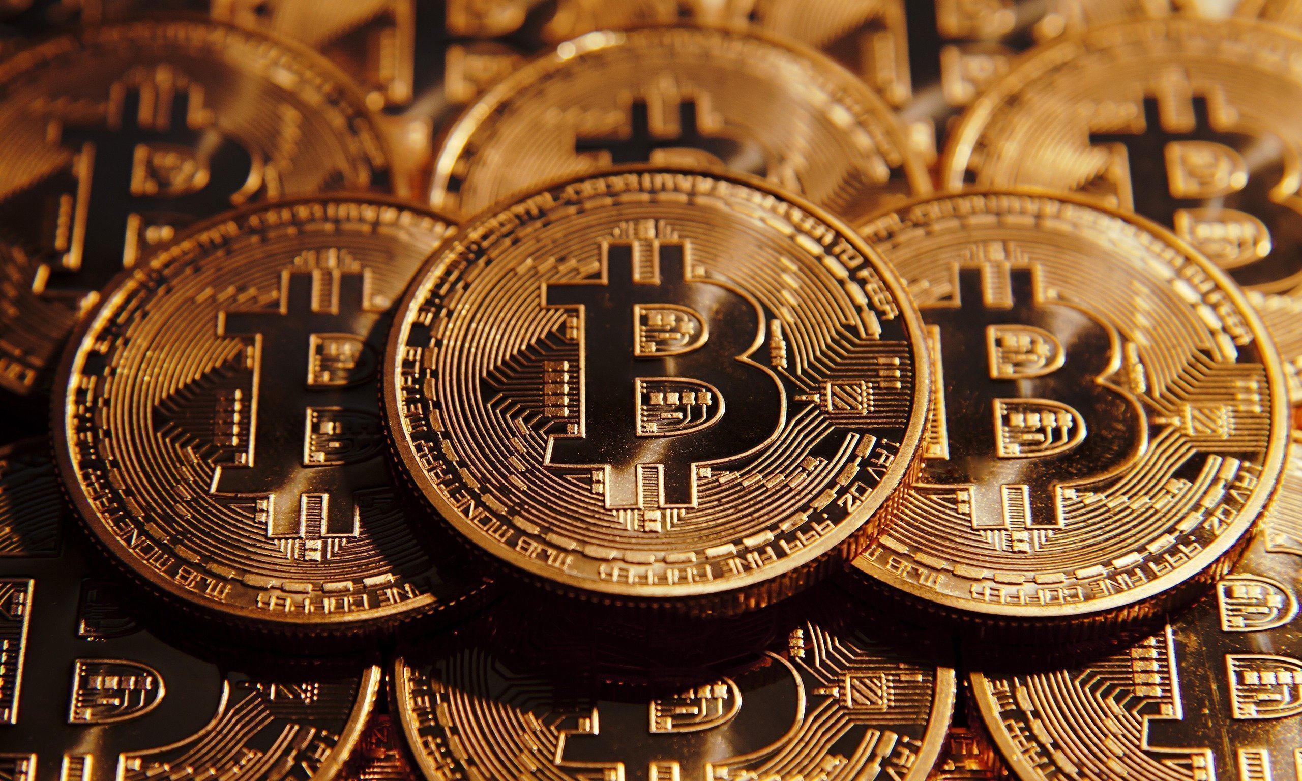 Bitcoin fiyatı 60.000 ABD Dolarını geçerek rekor seviyeye yaklaşıyor